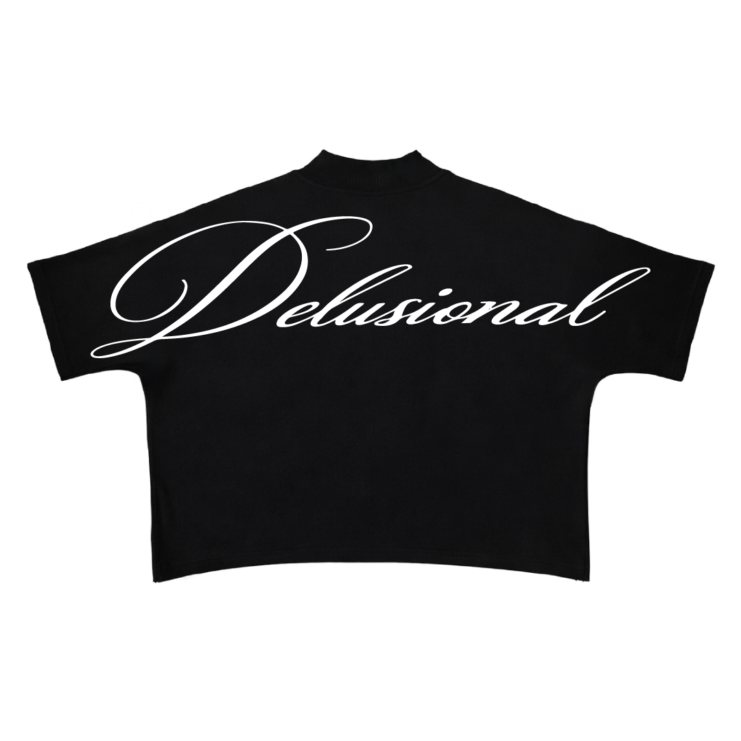 Black crop top with 'Delusional' text in white on a white background
